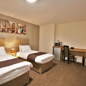 New County Hotel & Serviced Apartments By Roomsbooked